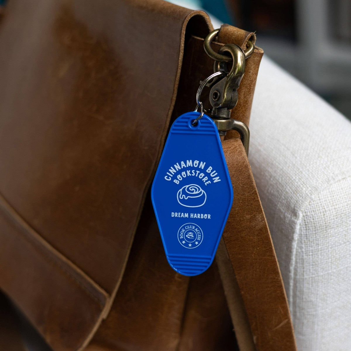 The Cinnamon Bun Book Store Motel Keychain – Dream Harbor