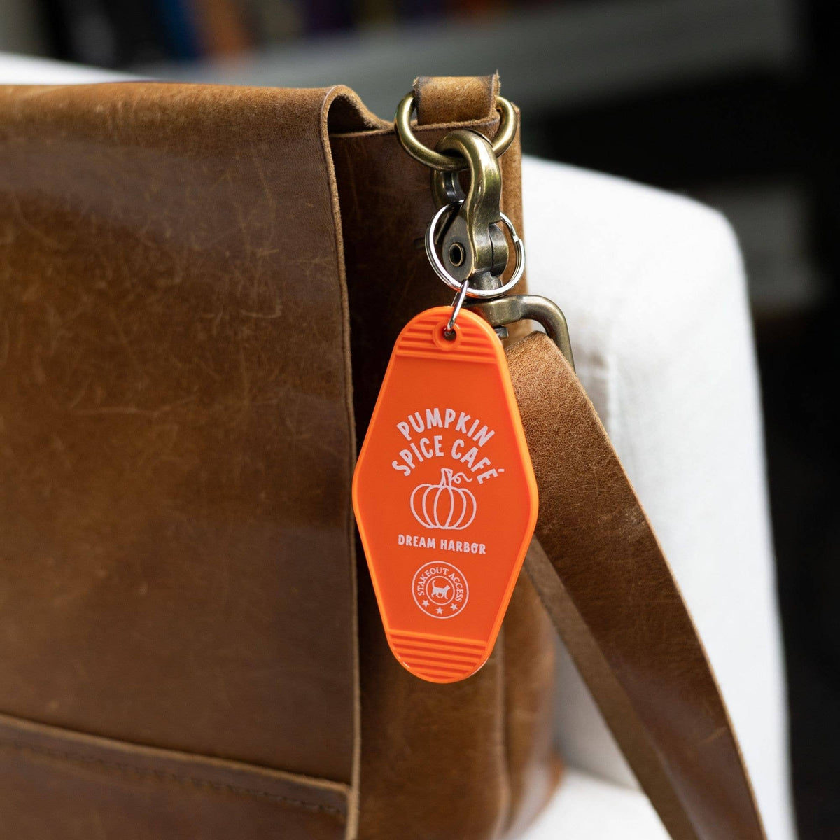 The Pumpkin Spice Café Motel Keychain – Dream Harbor